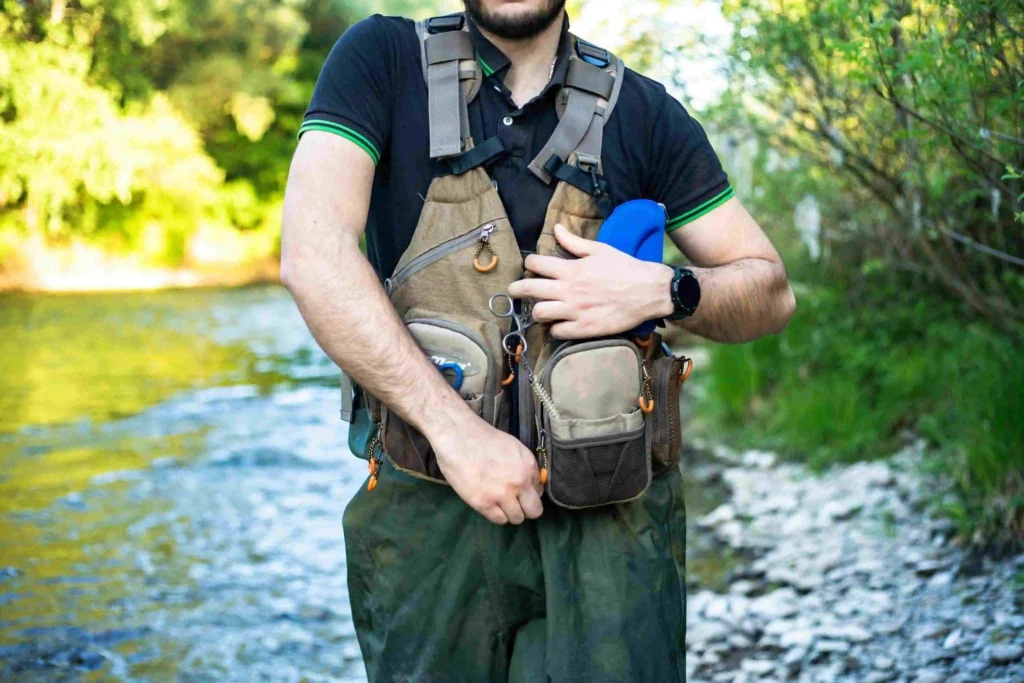 Wearing fly fishing vest