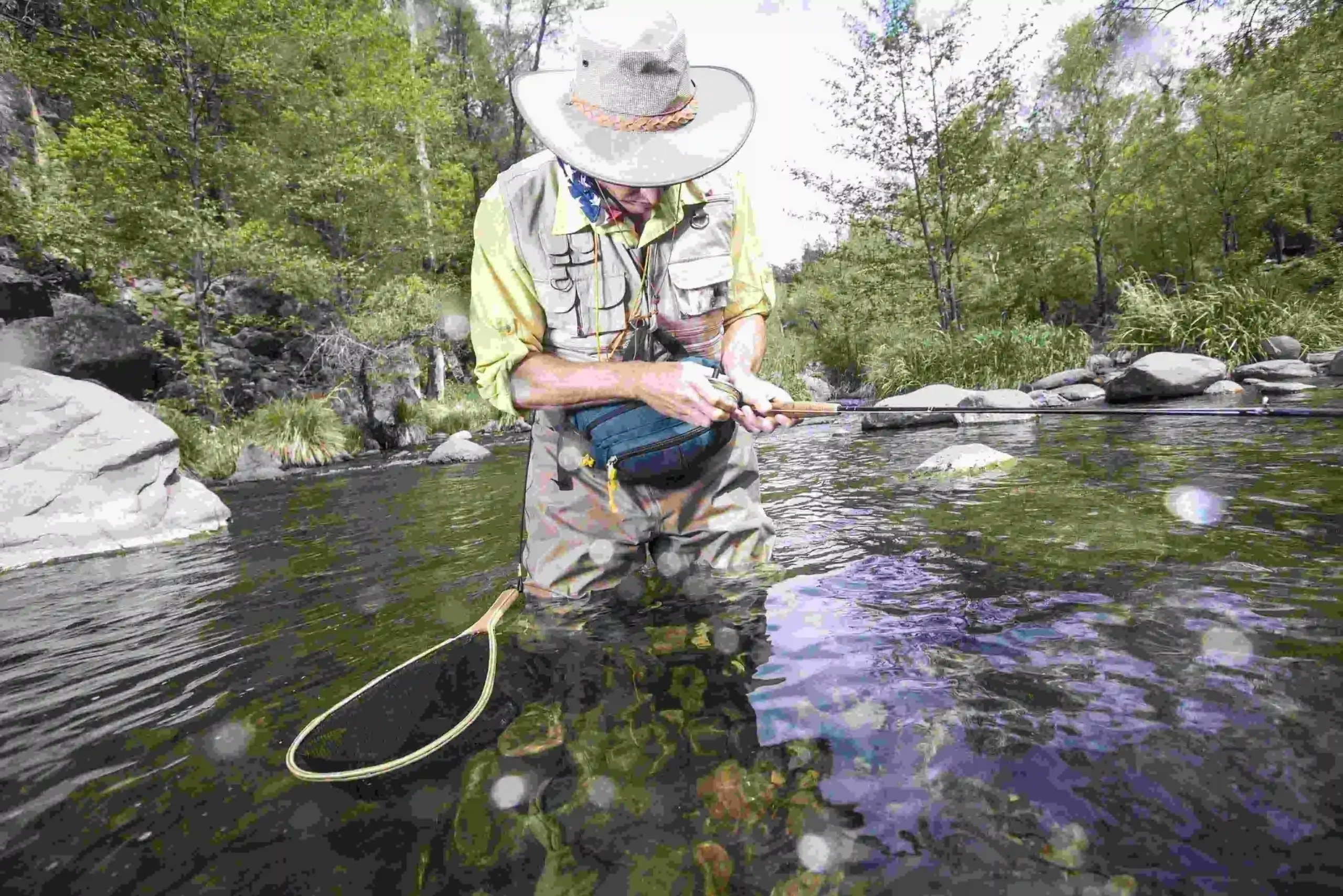 Wearing fly fishing vest